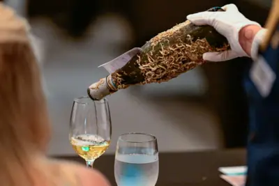 Wine of the Sea underwater-aged wine being poured for tasting